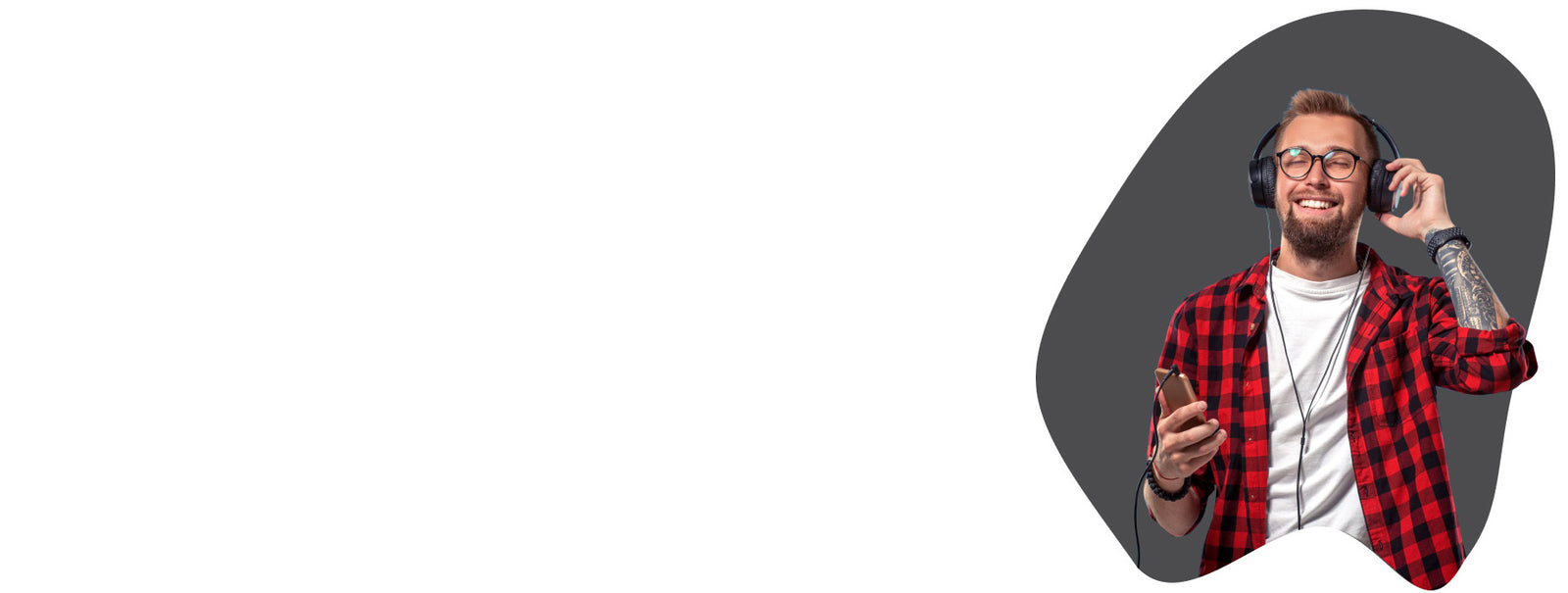 Guy listening to music on his headphones. Loud music can cause noise induced hearing loss. To avoid this wear custom ear plugs and custom hearing protection.